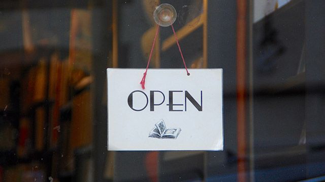 An open sign in a store window