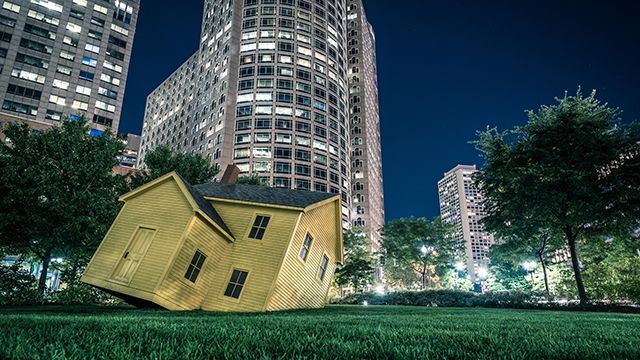 A sculpture in the Rose Kennedy Greenway in Boston at night 